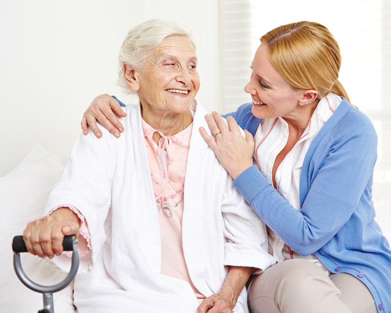 Senior receiving assisted living care at seniors community in Maple Ridge