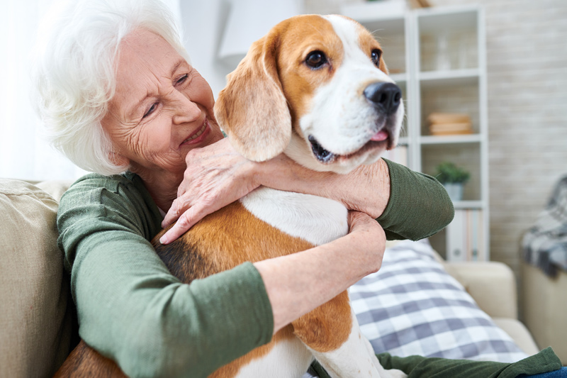 Senior with pet at retirement community in Maple Ridge